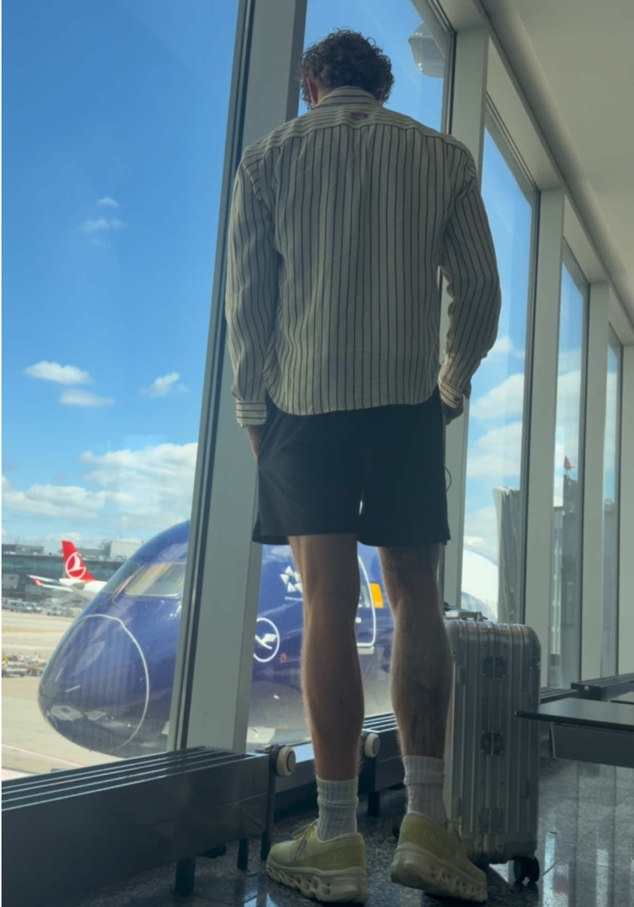 Airport departure with Rimowa suitcase