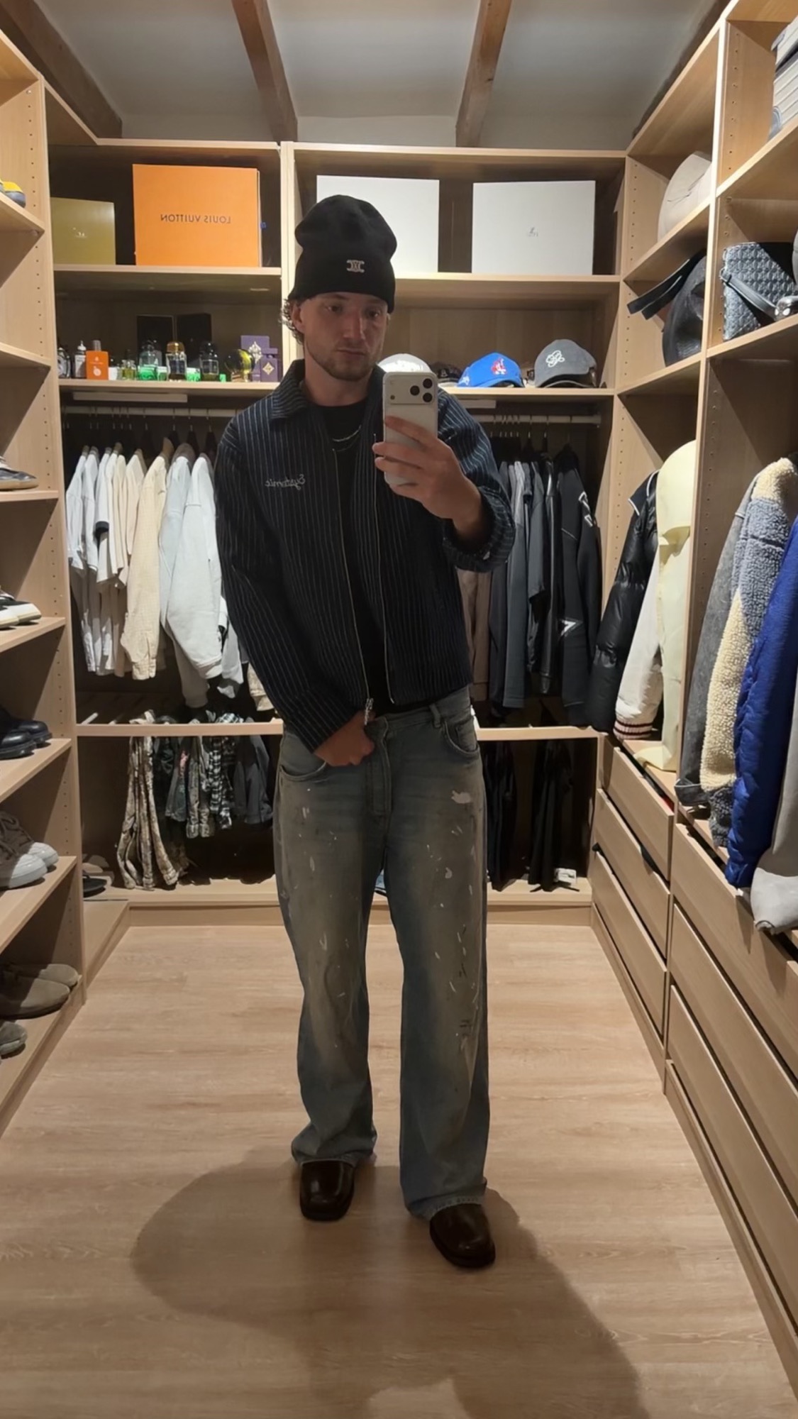 Closet mirror selfie in pinstripe jacket