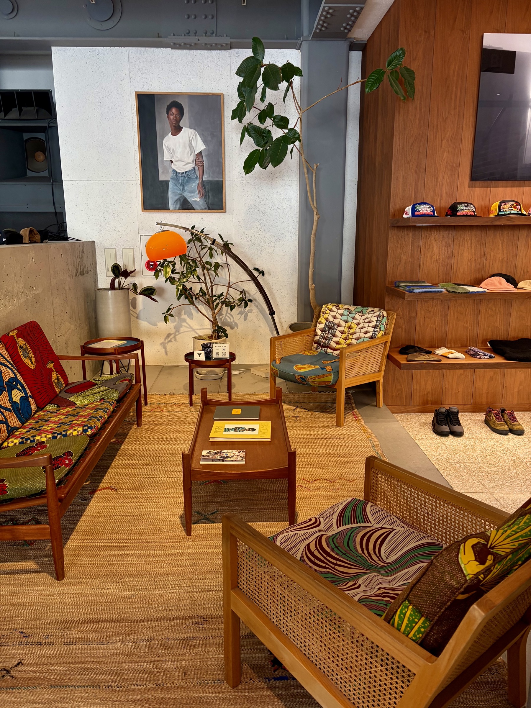 Styled concept store interior with sneakers and caps