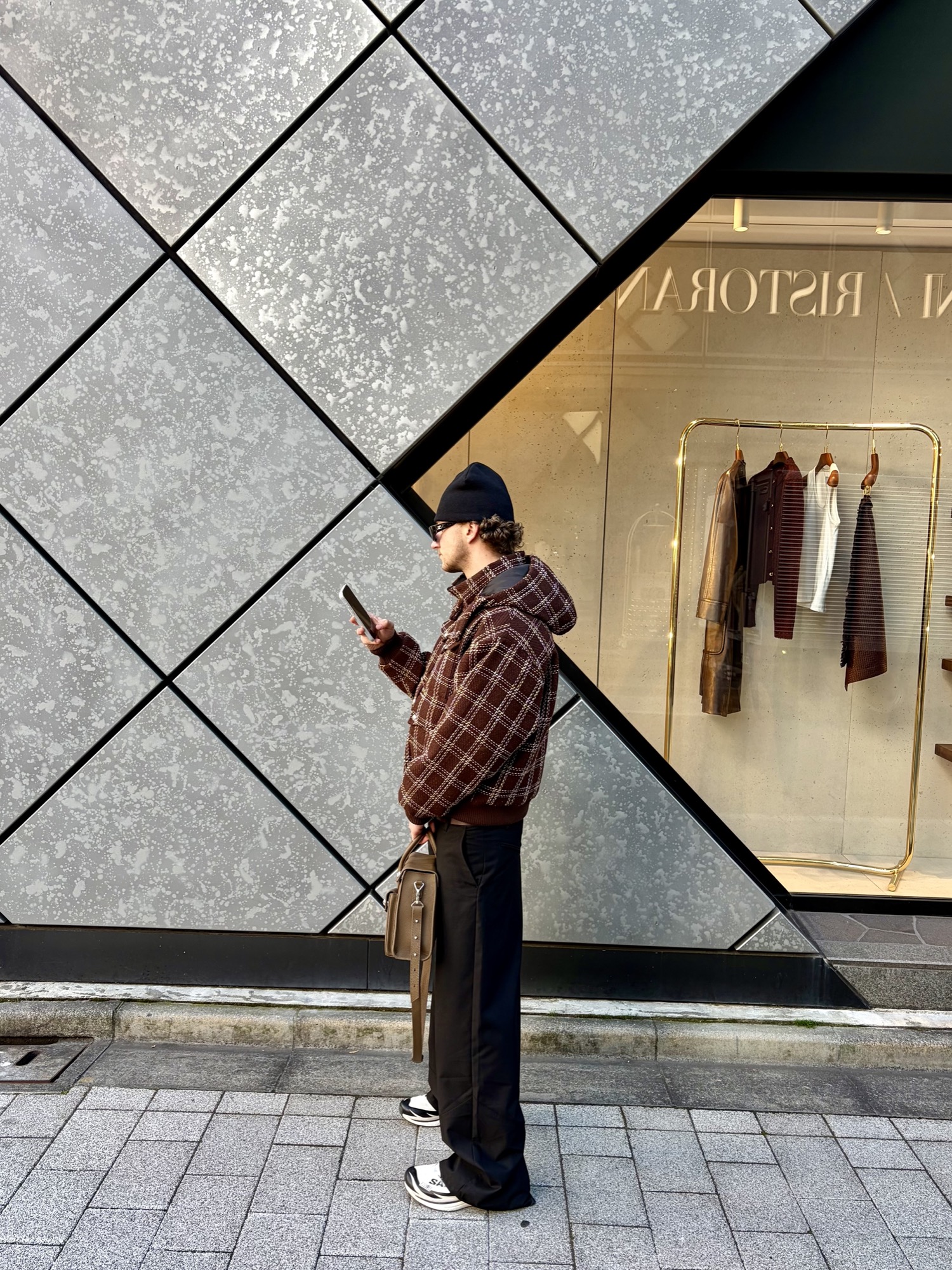 Street style outside a boutique storefront